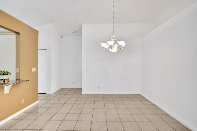8140 Palm Gate Dr, Boynton Beach, FL 33436 - spare room featuring a chandelier and light tile patterned flooring