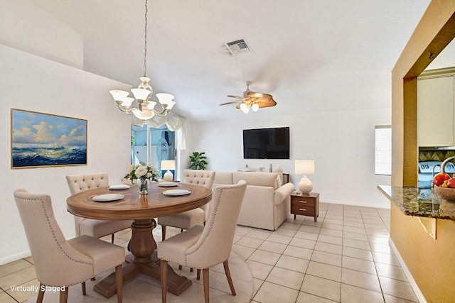 8140 Palm Gate Dr, Boynton Beach, FL 33436 - dining room with a chandelier, light tile patterned flooring, healthy amount of natural light, and ceiling fan