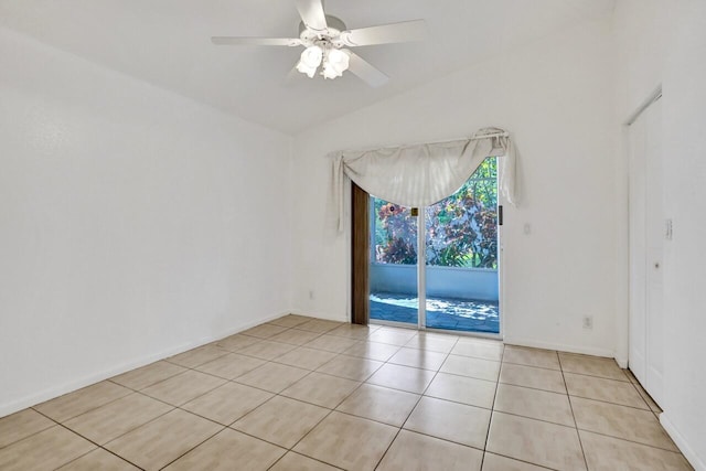 8140 Palm Gate Dr, Boynton Beach, FL 33436 - unfurnished room featuring lofted ceiling, light tile patterned floors, and a ceiling fan