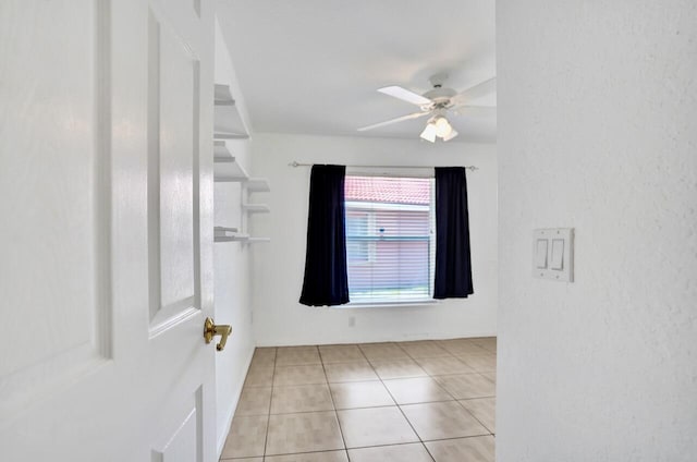8140 Palm Gate Dr, Boynton Beach, FL 33436 - empty room with ceiling fan and light tile patterned floors