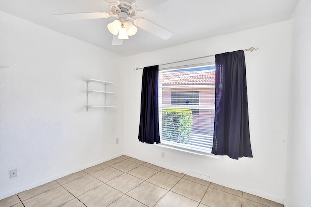 8140 Palm Gate Dr, Boynton Beach, FL 33436 - unfurnished room featuring light tile patterned floors and a ceiling fan