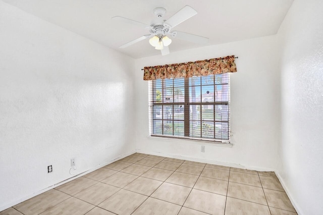 8140 Palm Gate Dr, Boynton Beach, FL 33436 - spare room with light tile patterned floors and ceiling fan