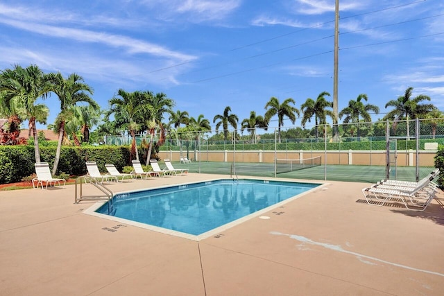 8140 Palm Gate Dr, Boynton Beach, FL 33436 - community pool featuring a tennis court and a patio