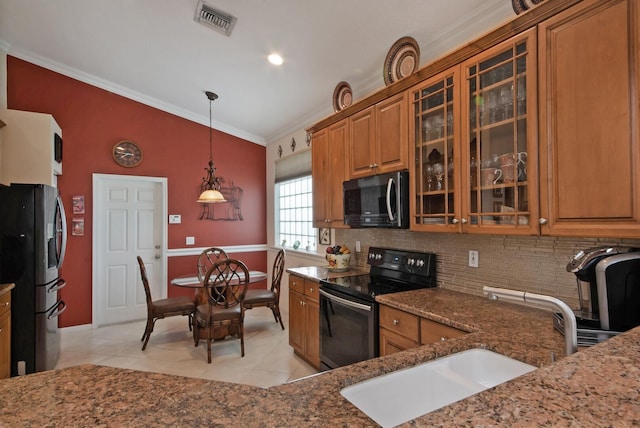 7052 Cataluna Cir, Delray Beach, FL 33446 - kitchen with black / electric stove, refrigerator with ice dispenser, brown cabinets, light tile patterned flooring, and vaulted ceiling