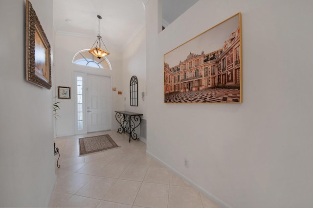 7052 Cataluna Cir, Delray Beach, FL 33446 - tiled entryway with crown molding and a towering ceiling