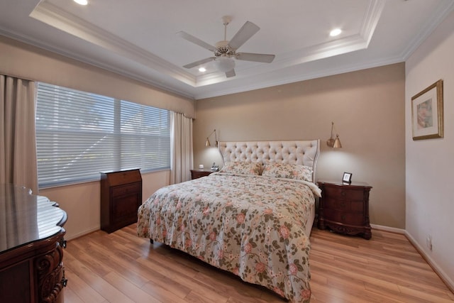 7052 Cataluna Cir, Delray Beach, FL 33446 - bedroom featuring a tray ceiling, crown molding, light wood-style flooring, a ceiling fan, and recessed lighting