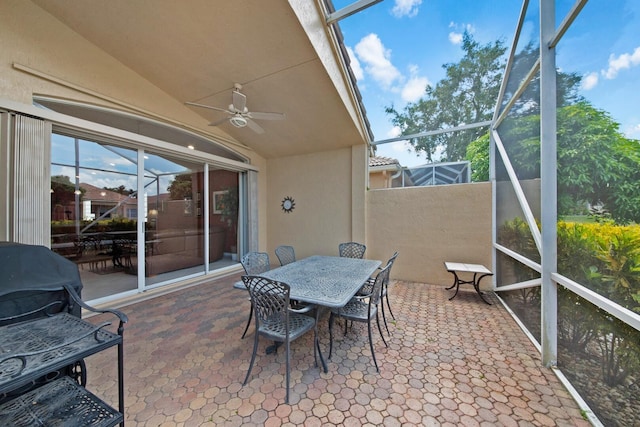 7052 Cataluna Cir, Delray Beach, FL 33446 - sunroom / solarium featuring a ceiling fan, vaulted ceiling, and outdoor dining space