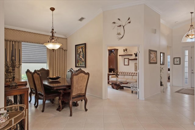7052 Cataluna Cir, Delray Beach, FL 33446 - dining space with plenty of natural light, crown molding, high vaulted ceiling, and light tile patterned floors