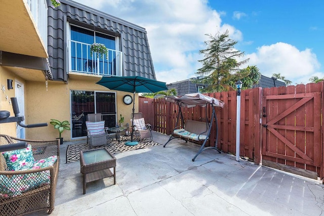 22164 Boca Rancho Dr Unit D, Boca Raton, FL 33428 - view of patio / terrace featuring a gate
