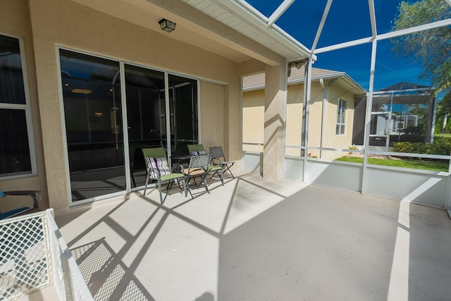619 NW Monticello Pl, Port Saint Lucie, FL 34986 - view of patio / terrace featuring glass enclosure