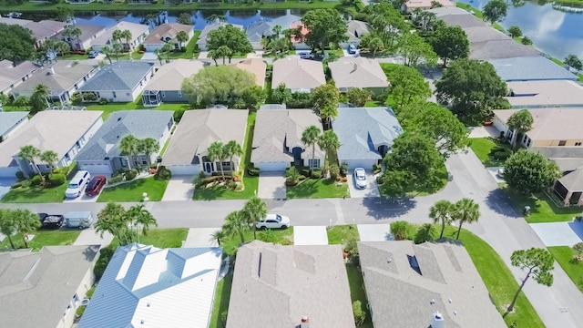 619 NW Monticello Pl, Port Saint Lucie, FL 34986 - aerial perspective of suburban area with a large body of water