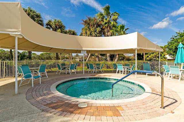 619 NW Monticello Pl, Port Saint Lucie, FL 34986 - view of swimming pool featuring a patio area, outdoor dining area, and a swimming pool