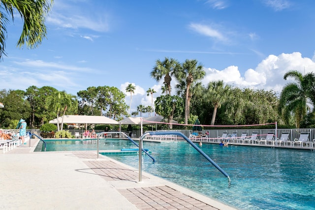 619 NW Monticello Pl, Port Saint Lucie, FL 34986 - community pool featuring a patio area