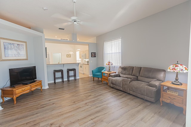 619 NW Monticello Pl, Port Saint Lucie, FL 34986 - living room featuring light wood-type flooring and a ceiling fan