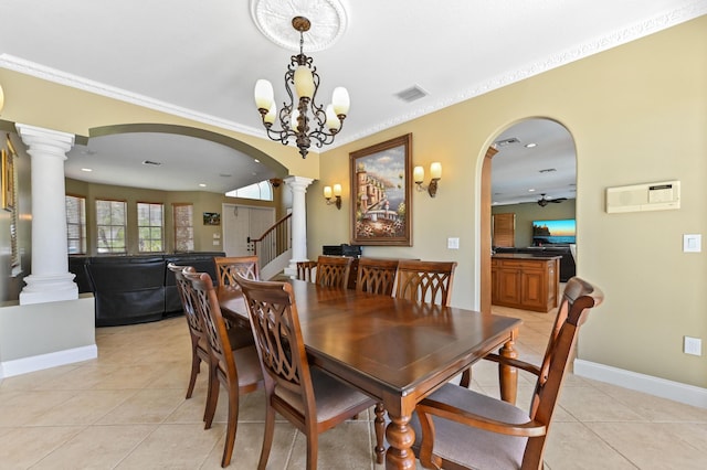 7486 Greenville Cir, Lake Worth, FL 33467 - dining room with ornate columns, arched walkways, light tile patterned floors, ceiling fan, and recessed lighting