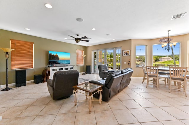 7486 Greenville Cir, Lake Worth, FL 33467 - living area with recessed lighting, a chandelier, light tile patterned flooring, and ceiling fan