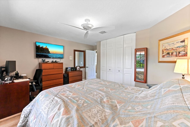 7486 Greenville Cir, Lake Worth, FL 33467 - bedroom featuring a closet, an office area, and a ceiling fan
