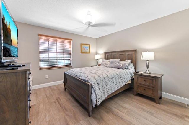 7486 Greenville Cir, Lake Worth, FL 33467 - bedroom featuring light wood-style flooring and ceiling fan