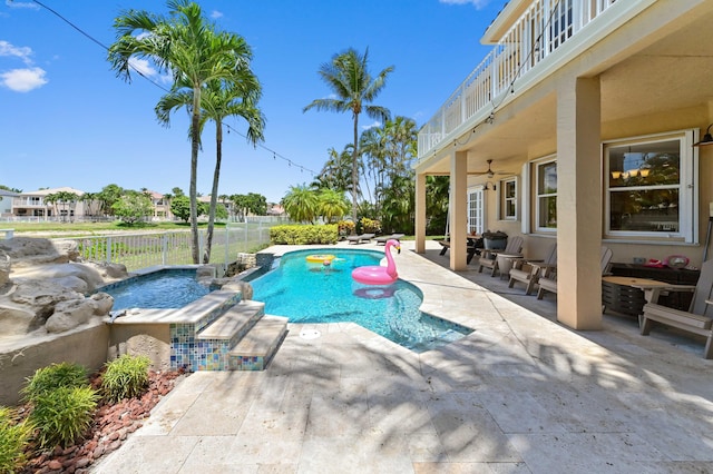 7486 Greenville Cir, Lake Worth, FL 33467 - view of swimming pool featuring a fenced backyard, a patio area, a pool with connected hot tub, and ceiling fan