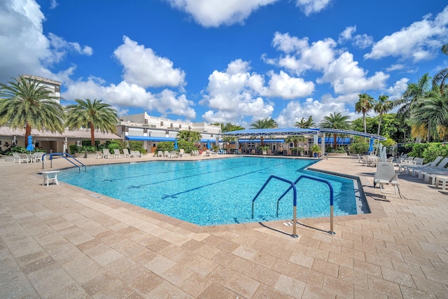 9976 Seacrest Cir Unit D, Boynton Beach, FL 33437 - community pool featuring a patio area