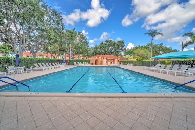 9976 Seacrest Cir Unit D, Boynton Beach, FL 33437 - community pool featuring a patio area