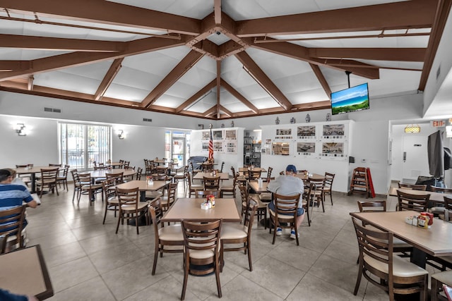 9976 Seacrest Cir Unit D, Boynton Beach, FL 33437 - dining room with high vaulted ceiling, beamed ceiling, and light tile patterned floors