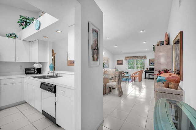 9976 Seacrest Cir Unit D, Boynton Beach, FL 33437 - kitchen featuring dishwasher, light countertops, white cabinets, and light tile patterned floors