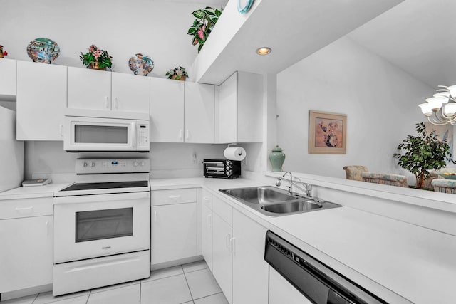 9976 Seacrest Cir Unit D, Boynton Beach, FL 33437 - kitchen featuring white appliances, light countertops, white cabinetry, and recessed lighting