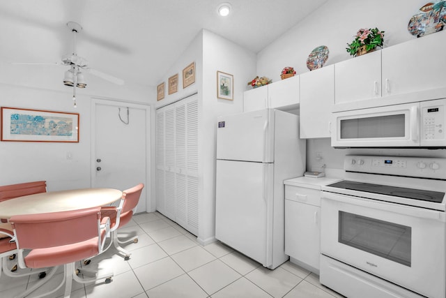 9976 Seacrest Cir Unit D, Boynton Beach, FL 33437 - kitchen featuring white appliances, white cabinetry, light countertops, and light tile patterned floors