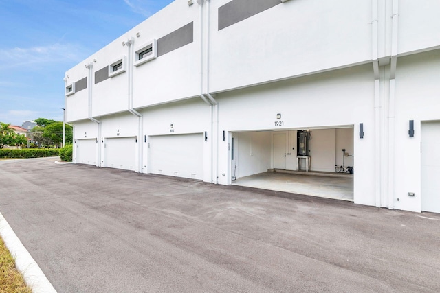 1921 Dock St, West Palm Beach, FL 33401 - view of property with a garage