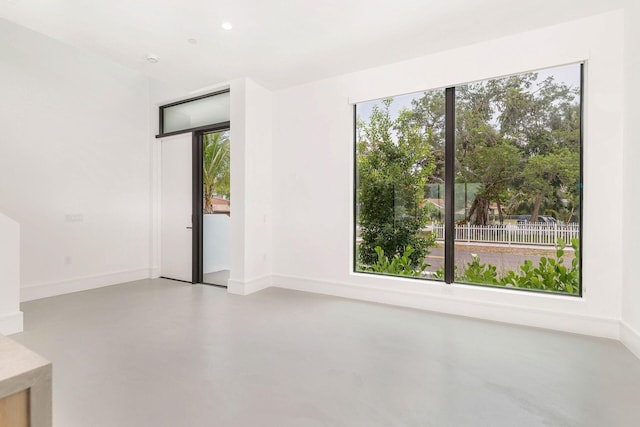 1921 Dock St, West Palm Beach, FL 33401 - unfurnished room featuring concrete floors and recessed lighting