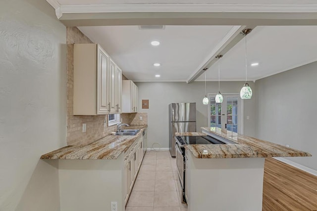 720 N Ocean Breeze, Lake Worth Beach, FL 33460 - kitchen with stainless steel appliances, backsplash, a kitchen island, light stone countertops, and recessed lighting