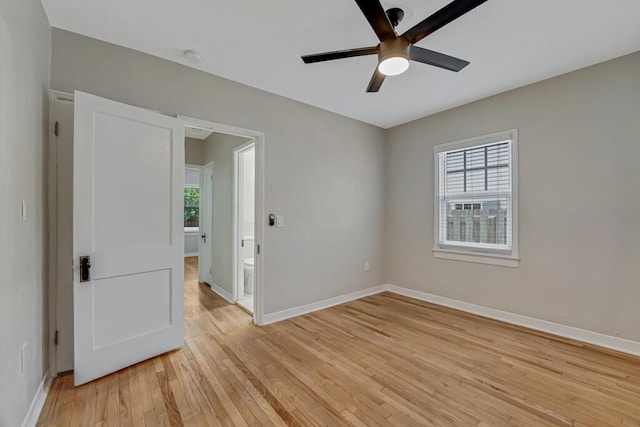 720 N Ocean Breeze, Lake Worth Beach, FL 33460 - spare room featuring a ceiling fan, healthy amount of natural light, light wood-type flooring, and a smoke detector
