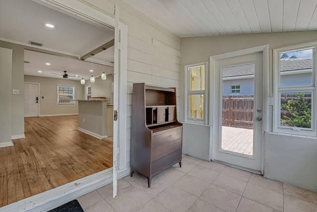720 N Ocean Breeze, Lake Worth Beach, FL 33460 - doorway to outside with vaulted ceiling, ceiling fan, light tile patterned floors, and recessed lighting