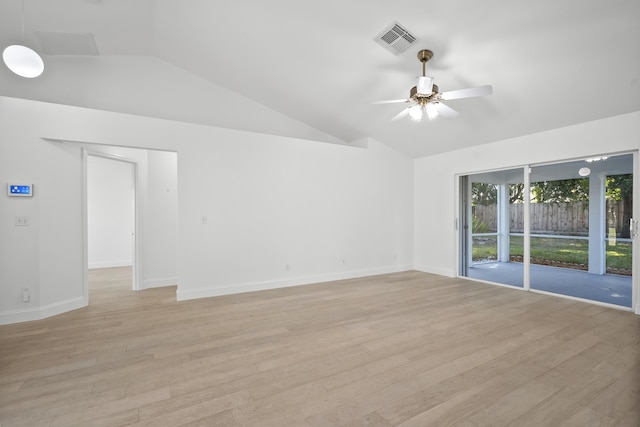 1633 SE Clearmont St, Port Saint Lucie, FL 34983 - spare room with vaulted ceiling, a ceiling fan, and light wood-style flooring