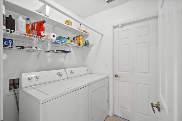 1633 SE Clearmont St, Port Saint Lucie, FL 34983 - laundry room with washing machine and dryer