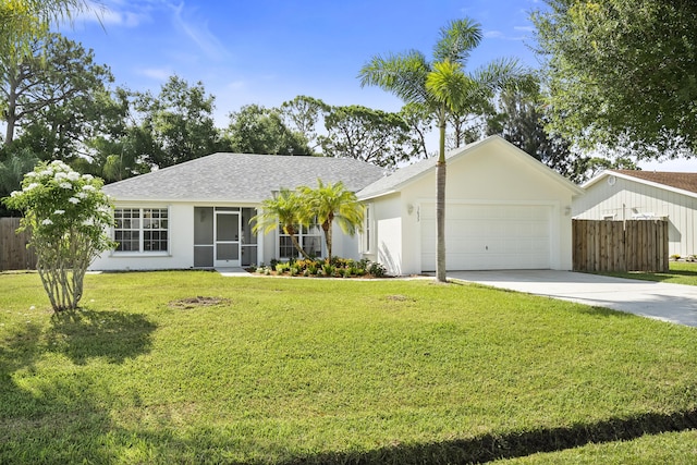 1633 SE Clearmont St, Port Saint Lucie, FL 34983 - ranch-style home featuring a garage, driveway, a shingled roof, and stucco siding