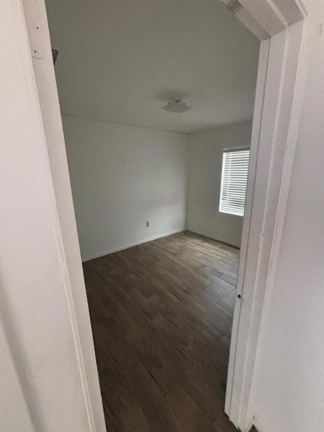 503 N 25th St, Fort Pierce, FL 34947 - spare room with dark wood-style floors