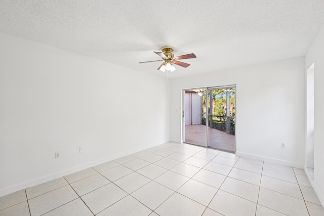 7 Greenway N Unit 111, Royal Palm Beach, FL 33411 - unfurnished room with ceiling fan, a textured ceiling, and light tile patterned floors