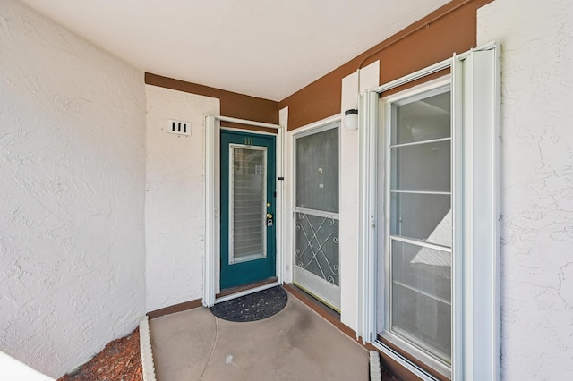 7 Greenway N Unit 111, Royal Palm Beach, FL 33411 - entrance to property with stucco siding