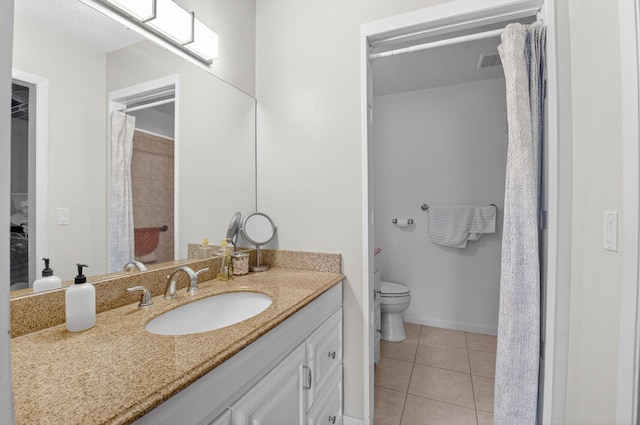 13984 Via Flora Unit B, Delray Beach, FL 33484 - bathroom featuring tile patterned flooring, vanity, and a shower with shower curtain
