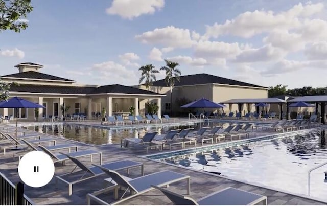 13984 Via Flora Unit B, Delray Beach, FL 33484 - view of property's community featuring a swimming pool and a patio area