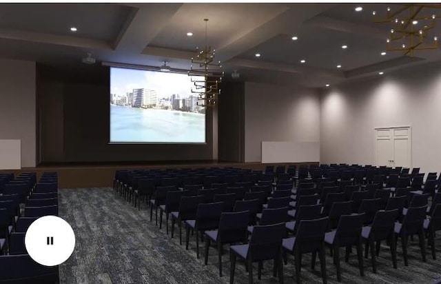 13984 Via Flora Unit B, Delray Beach, FL 33484 - cinema room with coffered ceiling, carpet floors, beam ceiling, and recessed lighting
