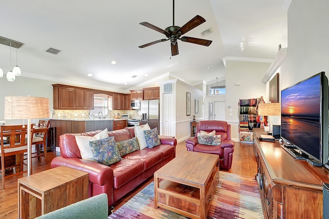 1738 Barnstable Rd, Wellington, FL 33414 - living room with a ceiling fan, light wood-style floors, lofted ceiling, crown molding, and recessed lighting