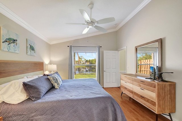 1738 Barnstable Rd, Wellington, FL 33414 - bedroom with multiple windows, lofted ceiling, wood finished floors, crown molding, and ceiling fan