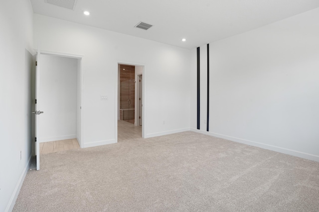 11687 SW Viridian Blvd, Port Saint Lucie, FL 34987 - unfurnished bedroom featuring light colored carpet and recessed lighting
