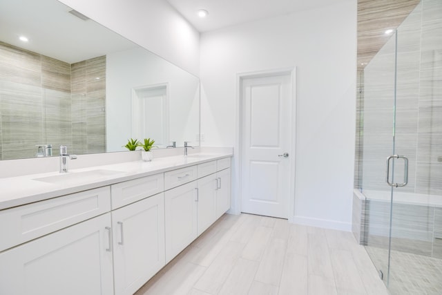 11687 SW Viridian Blvd, Port Saint Lucie, FL 34987 - full bathroom with double vanity, a shower stall, and recessed lighting