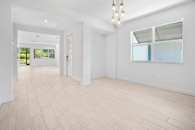 11687 SW Viridian Blvd, Port Saint Lucie, FL 34987 - unfurnished room with light wood-type flooring and recessed lighting