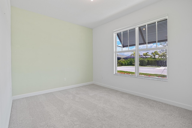 11687 SW Viridian Blvd, Port Saint Lucie, FL 34987 - carpeted empty room with baseboards
