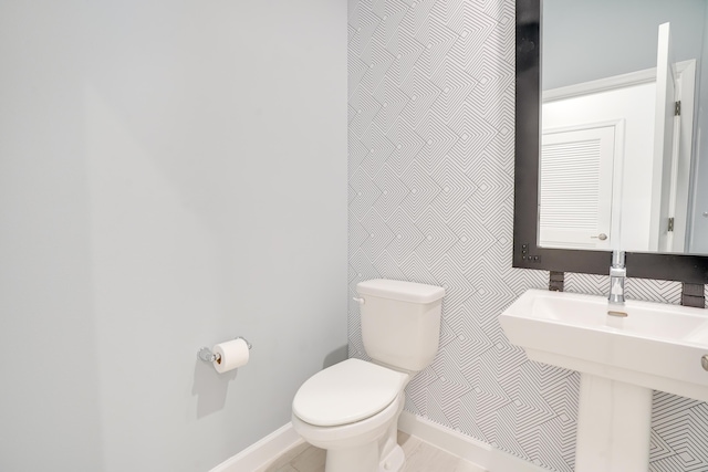 11687 SW Viridian Blvd, Port Saint Lucie, FL 34987 - bathroom with toilet and baseboards